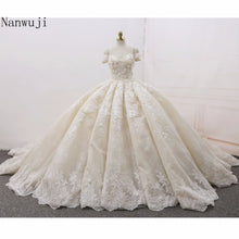 Load image into Gallery viewer, Ball Gown Luxury Wedding Dresses Arabic 2018 Real Photo 3D Floral Handmade Flowers Chapel Train Tulle Sleeveless Bridal Gowns
