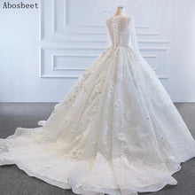 Load image into Gallery viewer, Ball Gown Wedding Dress Long Sleeve with 3D Flowers Sequins Pearls Beads Puffy Wedding Gowns for Bridal 2021 with Train Lace Up