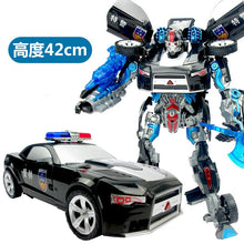 将图片加载到图库查看器,Transformers Optimus Prime Toy Bumblebee Children's Robot Steel Cable Large Dinosaur Model Car