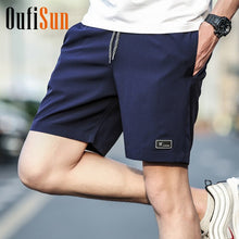 Load image into Gallery viewer, 4XL Men Summer Casual Shorts Men Brand New Board Shorts 2018 WaterProof Solid Breathable Elastic Waist Fashion Casual Short Men
