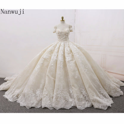 Ball Gown Luxury  Wedding Dresses Arabic  2018 Real Photo 3D Floral Handmade Flowers Chapel Train Tulle  Sleeveless Bridal Gowns