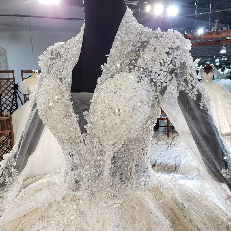 HTL1948 Luxurious Champagne Appliques Crystal Sequined Wedding Dress 2020 Long Sleeve Deep V-Neck Ball Gowns