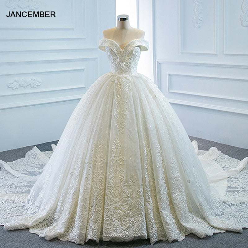 RSM66641 Luxury Elegant White V-neck Wedding Dress 2021 Draped Backless Applique Print Pattern Long Trailing Skirt
