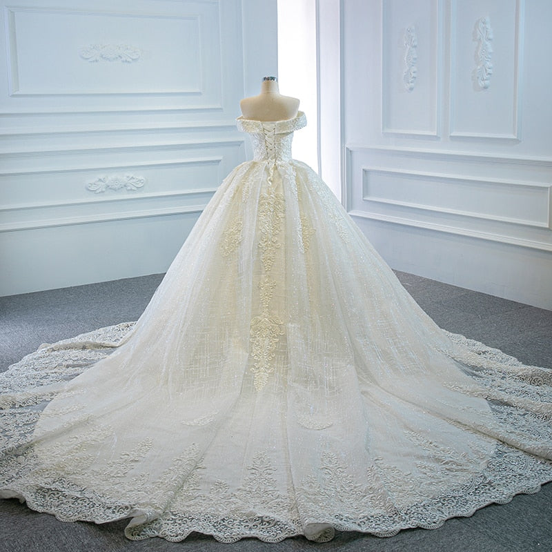 RSM66641 Luxury Elegant White V-neck Wedding Dress 2021 Draped Backless Applique Print Pattern Long Trailing Skirt