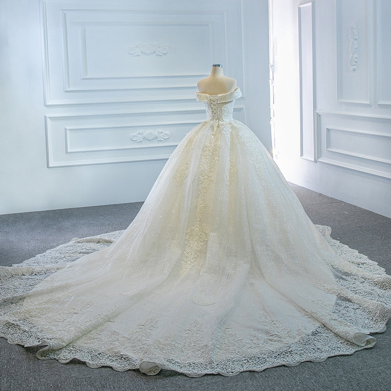 RSM66641 Luxury Elegant White V-neck Wedding Dress 2021 Draped Backless Applique Print Pattern Long Trailing Skirt